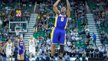 Apr 14, 2014; Salt Lake City, UT, USA; Los Angeles Lakers forward Nick Young (0) shoots during the second half against the Utah Jazz at EnergySolutions Arena. The Lakers won 119-104. Mandatory Credit: Russ Isabella-USA TODAY Sports