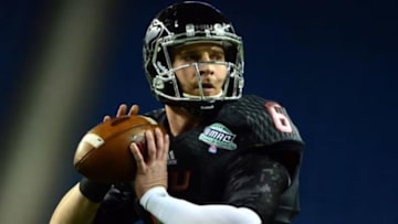 Dec 6, 2013; Detroit, MI, USA; Northern Illinois Huskies quarterback Jordan Lynch (6) warms up prior to the game against the Bowling Green Falcons at Ford Field. Mandatory Credit: Andrew Weber-USA TODAY Sports