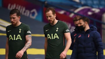 LEEDS, ENGLAND - MAY 08: Pierre-Emile Hoejbjerg and Harry Kane of Tottenham Hotspur look dejected after the Premier League match between Leeds United and Tottenham Hotspur at Elland Road on May 08, 2021 in Leeds, England. Sporting stadiums around the UK remain under strict restrictions due to the Coronavirus Pandemic as Government social distancing laws prohibit fans inside venues resulting in games being played behind closed doors. (Photo by Oli Scarff - Pool/Getty Images)