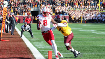 MINNEAPOLIS, MN - NOVEMBER 11: Stanley Morgan Jr. #8 of the Nebraska Cornhuskers pulls in a pass while Adekunle Ayinde #4 of the Minnesota Golden Gophers attempts the block in the fourth quarter against the Minnesota Golden Gophers at TCF Bank Stadium on November 11, 2017 in Minneapolis, Minnesota. Minnesota defeated Nebraska 54-21.(Photo by Adam Bettcher/Getty Images)