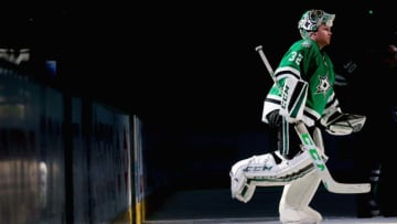 DALLAS, TX - APRIL 29: (EDITORS NOTE: Image has been converted to black and white.) Kari Lehtonen #32 of the Dallas Stars skates onto the ice to be recognized after the Stars beat the St. Louis Blues 2-1 in Game One of the Western Conference Second Round during the 2016 NHL Stanley Cup Playoffs at American Airlines Center on April 29, 2016 in Dallas, Texas. (Photo by Tom Pennington/Getty Images)