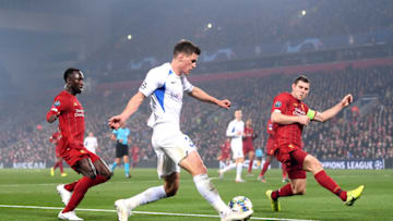 LIVERPOOL, ENGLAND - NOVEMBER 05: Joakim Maehle of KRC Genk crosses the ball in as James Milner of Liverpool attempts to block during the UEFA Champions League group E match between Liverpool FC and KRC Genk at Anfield on November 05, 2019 in Liverpool, United Kingdom. (Photo by Laurence Griffiths/Getty Images)