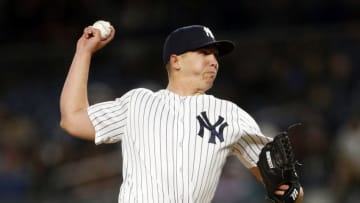 NEW YORK, NY - APRIL 19: Chad Green #57 of the New York Yankees pitches against the Toronto Blue Jays during the fifth inning at Yankee Stadium on April 19, 2018 in the Bronx borough of New York City. (Photo by Adam Hunger/Getty Images)