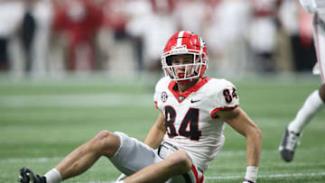 Dec 4, 2021; Atlanta, GA, USA; Georgia Bulldogs wide receiver Ladd McConkey (84) looks for an interference call against the Alabama Crimson Tide in the first half during the SEC championship game at Mercedes-Benz Stadium. Mandatory Credit: Brett Davis-USA TODAY Sports