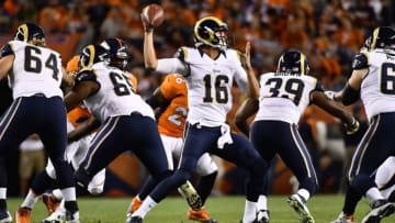 Aug 27, 2016; Denver, CO, USA; Los Angeles Rams quarterback Jared Goff (16) attempts a pass during the second quarter of a preseason game against the Denver Broncos at Sports Authority Field at Mile High. Mandatory Credit: Ron Chenoy-USA TODAY Sports