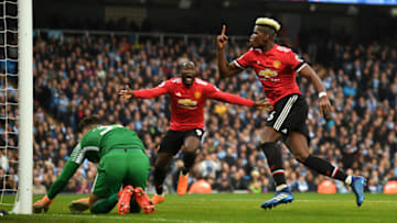 MANCHESTER, ENGLAND - APRIL 07: Paul Pogba of Manchester United celebrates after scoring his sides second goal during the Premier League match between Manchester City and Manchester United at Etihad Stadium on April 7, 2018 in Manchester, England. (Photo by Michael Regan/Getty Images)