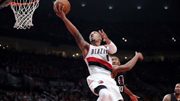 Oct 27, 2016; Portland, OR, USA; Portland Trail Blazers guard Damian Lillard (0) shoots over Los Angeles Clippers forward Wesley Johnson (33) in the second half at Moda Center. Mandatory Credit: Jaime Valdez-USA TODAY Sports