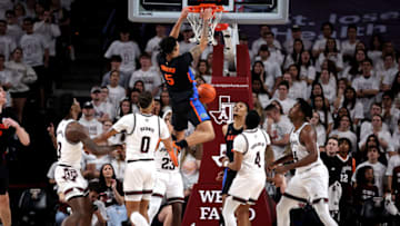 Jan 18, 2023; College Station, Texas, USA; Florida Gators guard Will Richard (5) makes a slam dunk against the Texas A&M Aggies during the second half at Reed Arena. Mandatory Credit: Erik Williams-USA TODAY Sports