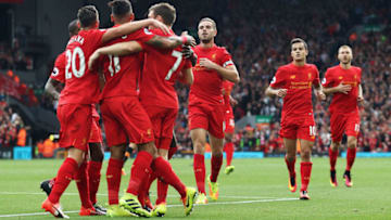 LIVERPOOL, ENGLAND - SEPTEMBER 24: James Milner of Liverpool (7) celebrates scoring his sides second goal with team mates during the Premier League match between Liverpool and Hull City at Anfield on September 24, 2016 in Liverpool, England. (Photo by Julian Finney/Getty Images)
