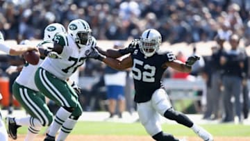 OAKLAND, CA - SEPTEMBER 17: Khalil Mack #52 of the Oakland Raiders matches up against Brandon Shell #72 of the New York Jets at Oakland-Alameda County Coliseum on September 17, 2017 in Oakland, California. (Photo by Ezra Shaw/Getty Images)
