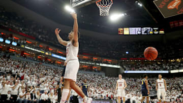 LOUISVILLE, KENTUCKY - DECEMBER 03: Jordan Nwora #33 of the Louisville Cardinals celebrates during the 58-43 win against the Michigan Wolverines at KFC YUM! Center on December 03, 2019 in Louisville, Kentucky. (Photo by Andy Lyons/Getty Images)
