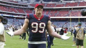 Nov 30, 2014; Houston, TX, USA; Houston Texans defensive end J.J. Watt (99) reacts after the game against the Tennessee Titans at NRG Stadium. The Texans beat the Titans 45-21. Mandatory Credit: Matthew Emmons-USA TODAY Sports
