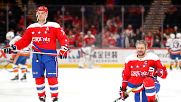 WASHINGTON, DC - DECEMBER 31: John Carlson (74) of the Washington Capitals and Alex Ovechkin (8) of the Washington Capitals on ice during warmups prior to their game against the New York Islanders at Capital One Arena on December 31, 2019 in Washington, DC. (Photo by Geoff Burke/NHLI via Getty Images)
