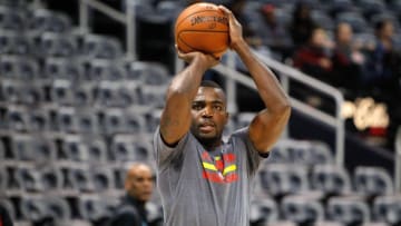 Dec 23, 2015; Atlanta, GA, USA; Atlanta Hawks forward Paul Millsap (4) shoots before a game against the Detroit Pistons at Philips Arena. Mandatory Credit: Brett Davis-USA TODAY Sports
