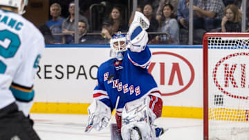 NEW YORK, NY - OCTOBER 11: Henrik Lundqvist (30) of the New York Rangers makes a stunning glove save during a game between the New York Rangers and the San Jose Sharks on October 11, 2018 at Madison Square Garden in New York, New York. (Photo by John McCreary/Icon Sportswire via Getty Images)
