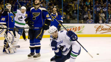 ST. LOUIS, MO. - APRIL 21: Alex Burrows #14 of the Vancouver Canucks celebrates his goal against the St. Louis Blues during Game Four of the Western Conference Quarterfinals of the 2009 NHL Stanley Cup Playoffs at the Scottrade Center on April 21, 2009 in St. Louis, Missouri. (Photo by Dilip Vishwanat/Getty Images)