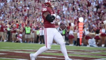 NORMAN, OK - SEPTEMBER 10 : Fullback Dimitri Flowers #36 of the Oklahoma Sooners celebrates a touchdown against the Louisiana Monroe Warhawks September 10, 2016 at Gaylord Family Memorial Stadium in Norman, Oklahoma. The Sooners defeated the Warhawks 59-17. (Photo by Brett Deering/Getty Images)