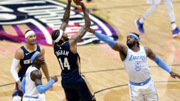 NEW ORLEANS, LOUISIANA - MARCH 23: Brandon Ingram #14 of the New Orleans Pelicans shoots over Wesley Matthews #9 of the Los Angeles Lakers during the third quarter of an NBA game at Smoothie King Center on March 23, 2021 in New Orleans, Louisiana. NOTE TO USER: User expressly acknowledges and agrees that, by downloading and or using this photograph, User is consenting to the terms and conditions of the Getty Images License Agreement. (Photo by Sean Gardner/Getty Images)