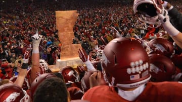 Nov 15, 2014; Fayetteville, AR, USA; Arkansas Razorbacks teammates celebrate after winning the game over the LSU Tigers at Donald W. Reynolds Razorback Stadium. The Arkansas Razorbacks defeat the LSU Tigers 17-0. Mandatory Credit: Jasen Vinlove-USA TODAY Sports