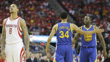Apr 24, 2016; Houston, TX, USA; Golden State Warriors guard Shaun Livingston (34) congratulates forward Draymond Green (23) while playing against Houston Rockets forward Michael Beasley (8) in the second half in game four of the first round of the NBA Playoffs at Toyota Center. Golden State Warriors won 121 to 94. Mandatory Credit: Thomas B. Shea-USA TODAY Sports