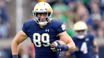 SOUTH BEND, INDIANA - OCTOBER 05: Brock Wright #89 of the Notre Dame Fighting Irish runs for a first down in the first half against the Bowling Green Falcons at Notre Dame Stadium on October 05, 2019 in South Bend, Indiana. (Photo by Quinn Harris/Getty Images)
