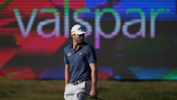 Mar 20, 2022; Palm Harbor, Florida, USA; Sam Burns walks up to the 18th green during the final round of the Valspar Championship golf tournament. Mandatory Credit: Jasen Vinlove-USA TODAY Sports