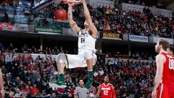 INDIANAPOLIS, IN - MARCH 11: Gavin Schilling #34 of the Michigan State Spartans dunks against the Ohio State Buckeyes in the quarterfinal round of the Big Ten Basketball Tournament at Bankers Life Fieldhouse on March 11, 2016 in Indianapolis, Indiana. Michigan State defeated Ohio State 81-54. (Photo by Joe Robbins/Getty Images)