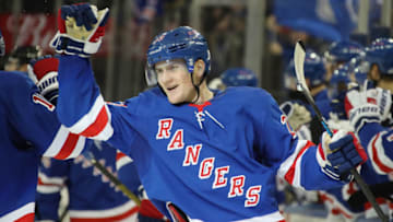 Adam Fox #23 of the New York Rangers celebrates his first NHL goal . (Photo by Bruce Bennett/Getty Images)
