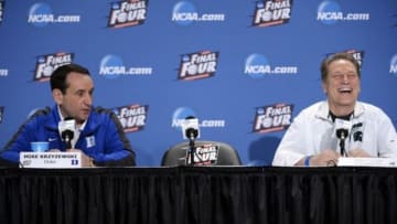 Apr 2, 2015; Indianapolis, IN, USA; Duke Blue Devils head coach Mike Krzyzewski speaks to the media as Michigan State Spartans head coach Tom Izzo laughs during a press conference before the 2015 NCAA Men