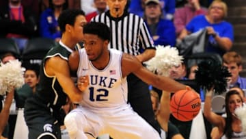 Nov 18, 2014; Indianapolis, IN, USA; Duke Blue Devils forward Justise Winslow (12) drives against Michigan State Spartans guard Bryn Forbes (5) in the 1st half of the State Farm Champions Classic at Bankers Life Fieldhouse. Mandatory Credit: Porter Binks-USA TODAY Sports