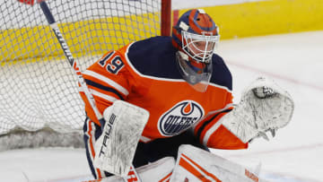 Jan 20, 2022; Edmonton, Alberta, CAN; Edmonton Oilers goaltender Mikko Koskinen (19) makes a save during warmup against the Florida Panthers at Rogers Place. Mandatory Credit: Perry Nelson-USA TODAY Sports