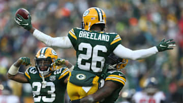 GREEN BAY, WISCONSIN - DECEMBER 09: Bashaud Breeland #26 of the Green Bay Packers celebrates with teammates after recovering a fumble during the second half of a game against the Atlanta Falcons at Lambeau Field on December 09, 2018 in Green Bay, Wisconsin. (Photo by Dylan Buell/Getty Images)