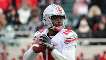 EAST LANSING, MI - NOVEMBER 19: J.T. Barrett #16 of the Ohio State Buckeyes drops back to pass during the fourth quarter of the game against the Michigan State Spartans at Spartan Stadium on November 19, 2016 in East Lansing, Michigan. Ohio State defeated Michigan State 17-16. (Photo by Leon Halip/Getty Images)
