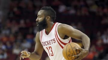 Oct 7, 2015; Houston, TX, USA; Houston Rockets guard James Harden (13) dribbles against the Dallas Mavericks in the first quarter at Toyota Center. Mandatory Credit: Thomas B. Shea-USA TODAY Sports