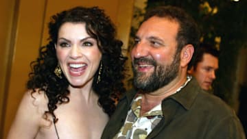 Julianna Marguiles and Producer Joel Silver at the premiere of "Ghost Ship" at the Mann Village Theatre in Westwood, Ca. Tuesday, Oct. 22, 2002. Photo by Kevin Winter/Getty Images.
