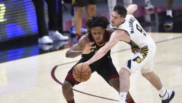 Mar 3, 2021; Cleveland, Ohio, USA; Indiana Pacers guard T.J. McConnell (9) steals the ball from Cleveland Cavaliers guard Collin Sexton (2) late in the fourth quarter at Rocket Mortgage FieldHouse. Mandatory Credit: David Richard-USA TODAY Sports