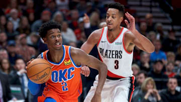 OKC Thunder guard Shai Gilgeous-Alexander (2) dribbles past Portland Trail Blazers guard CJ McCollum (3): Craig Mitchelldyer-USA TODAY Sports