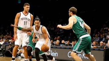 Oct 13, 2016; Brooklyn, NY, USA; Brooklyn Nets guard Jeremy Lin (7) plays the ball against Boston Celtics forward Tyler Zeller (44) during a preseason game during the first half at Barclays Center. The Celtics won 100-97. Mandatory Credit: Andy Marlin-USA TODAY Sports