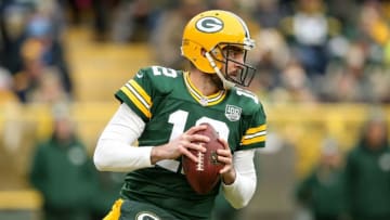 GREEN BAY, WISCONSIN - DECEMBER 30: Aaron Rodgers #12 of the Green Bay Packers drops back to pass in the first quarter against the Detroit Lions at Lambeau Field on December 30, 2018 in Green Bay, Wisconsin. (Photo by Dylan Buell/Getty Images)