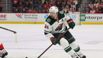 DETROIT, MICHIGAN - MARCH 10: Matt Dumba #24 of the Minnesota Wild skates against the Detroit Red Wings at Little Caesars Arena on March 10, 2022 in Detroit, Michigan. (Photo by Gregory Shamus/Getty Images)
