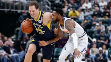 INDIANAPOLIS, IN - MARCH 24: Bojan Bogdanovic #44 of the Indiana Pacers dribbles the ball against Will Barton #5 of the Denver Nuggets at Bankers Life Fieldhouse on March 24, 2019 in Indianapolis, Indiana. (Photo by Michael Hickey/Getty Images)