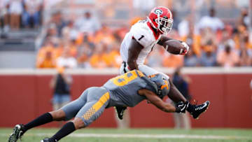 KNOXVILLE, TN - SEPTEMBER 30: Sony Michel #1 of the Georgia Bulldogs runs the ball against Nigel Warrior #18 of the Tennessee Volunteers in the third quarter of a game at Neyland Stadium on September 30, 2017 in Knoxville, Tennessee. Georgia won 41-0. (Photo by Joe Robbins/Getty Images)