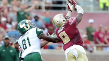 Sep 12, 2015; Tallahassee, FL, USA; University of South Florida Bulls wide receiver Ryeshene Bronson (81) cannot catch a pass as it is defended by Florida State Seminoles defensive back Jalen Ramsey (8) during the first half of the game at Doak Campbell Stadium. Mandatory Credit: Melina Vastola-USA TODAY Sports