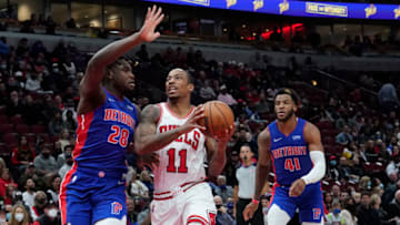 Chicago Bulls forward DeMar DeRozan (11) goes to the basket as Detroit Pistons center Isaiah Stewart (28) defends him Credit: David Banks-USA TODAY Sports
