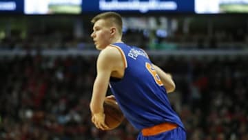 Jan 1, 2016; Chicago, IL, USA; New York Knicks forward Kristaps Porzingis (6)looks to pass the ball against the Chicago Bulls during the first half at United Center. Mandatory Credit: Kamil Krzaczynski-USA TODAY Sports
