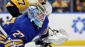 Oct 6, 2023; Buffalo, New York, USA; Buffalo Sabres goaltender Devon Levi (27) looks for the puck during the third period against the Pittsburgh Penguins at KeyBank Center. Mandatory Credit: Timothy T. Ludwig-USA TODAY Sports