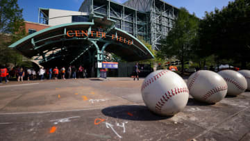 HOUSTON, TEXAS - APRIL 08: Fans wait to enter the park for a game between the Houston Astros and the Oakland Athletics at Minute Maid Park on April 08, 2021 in Houston, Texas. (Photo by Carmen Mandato/Getty Images)