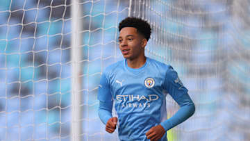 MANCHESTER, ENGLAND - JULY 31: Samuel Edozie of Manchester City celebrates after scoring during the pre-season friendly match between Manchester City and Barnsley at Manchester City Football Academy on July 31, 2021 in Manchester, England. (Photo by James Gill - Danehouse/Getty Images)