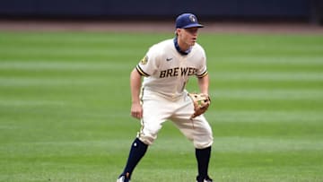 MILWAUKEE, WISCONSIN - JULY 14: Brock Holt #11 of the Milwaukee Brewers anticipates a pitch during Summer Workouts at Miller Park on July 14, 2020 in Milwaukee, Wisconsin. (Photo by Stacy Revere/Getty Images)