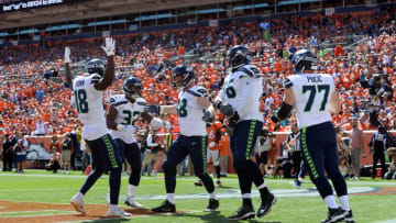 DENVER, CO - SEPTEMBER 9: Tight end Will Dissly #88 of the Seattle Seahawks celebrates with his team after scoring a touchdown against the Denver Broncos at Broncos Stadium at Mile High on September 9, 2018 in {Denver, Colorado. (Photo by Bart Young/Getty Images)